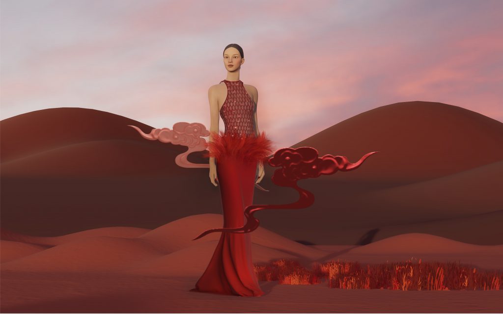 Người mẫu mặc váy đỏ nổi bật giữa khung cảnh sa mạc ảo diệu