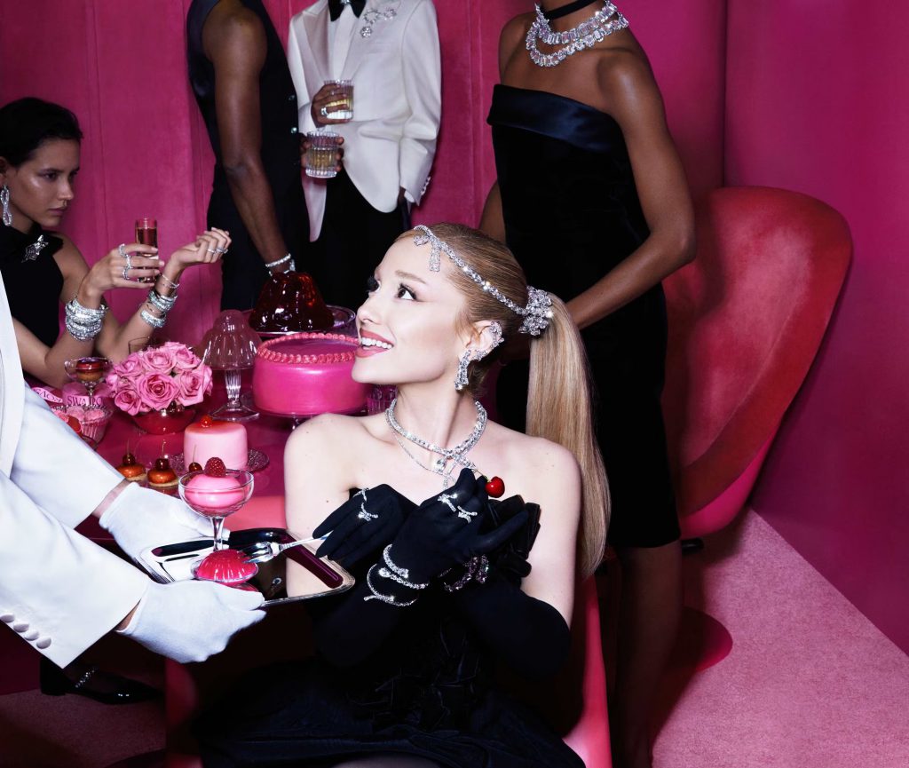 Ariana Grande wears sparkling jewelry at a glamorous pink party