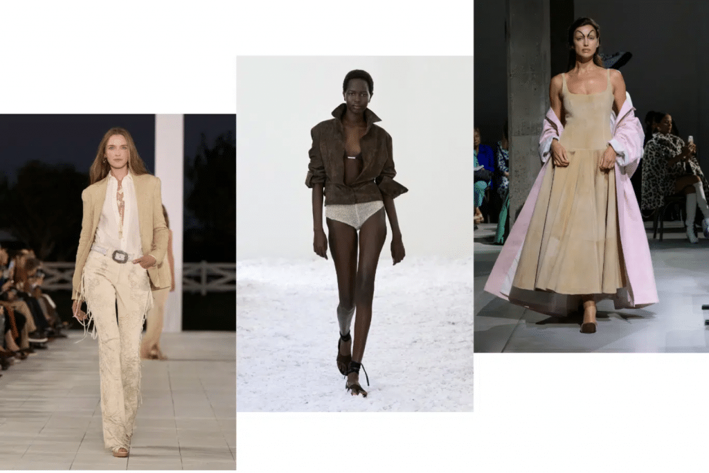Ba người mẫu trình diễn các bộ trang phục thời trang hiện đại trên sàn diễn