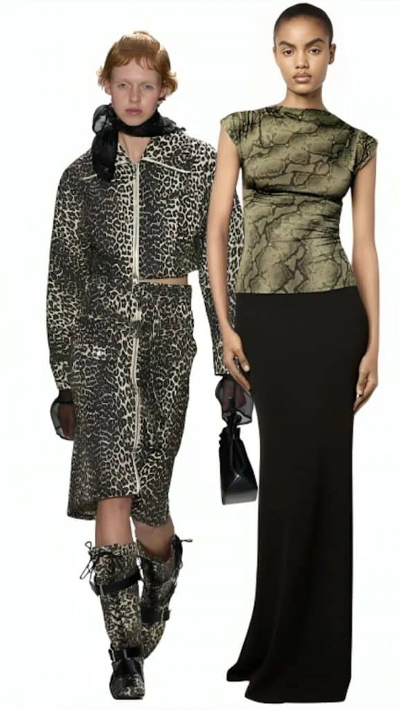 Hai người mẫu trình diễn trang phục với họa tiết da báo và váy đen dài
