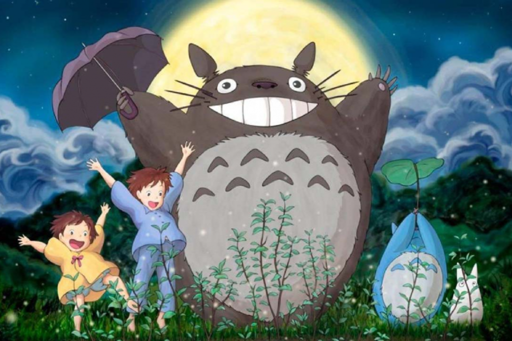 Hai em nhỏ vui vẻ bên Totoro khổng lồ dưới ánh trăng tròn